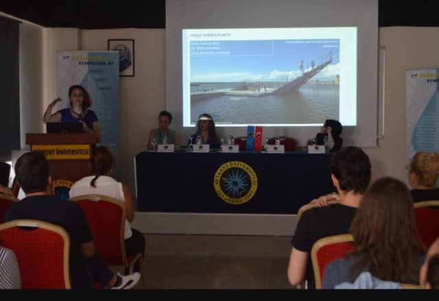 image 8 from International Symposium of Design for Living with Water event speakers speaking about Design for Living with Water